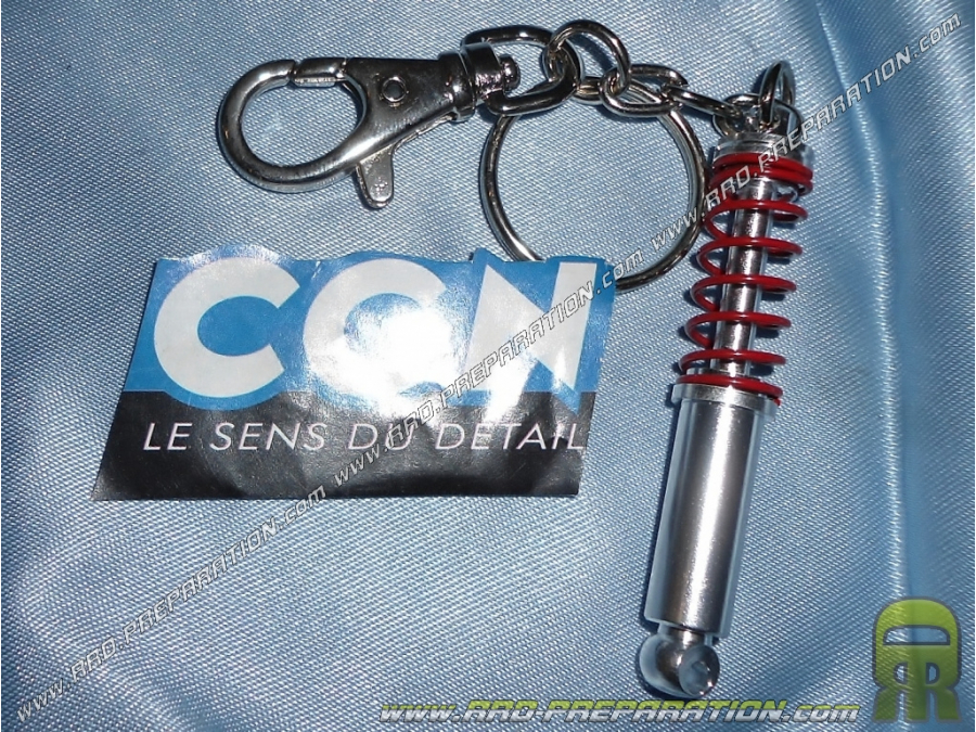 Porte clef amortisseur chromé / rouge CGN